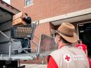 Red Cross volunteers load comfort and clean-up kits for winter storm victims. [Courtesy of Kevin McCoy, KF5FUZ]